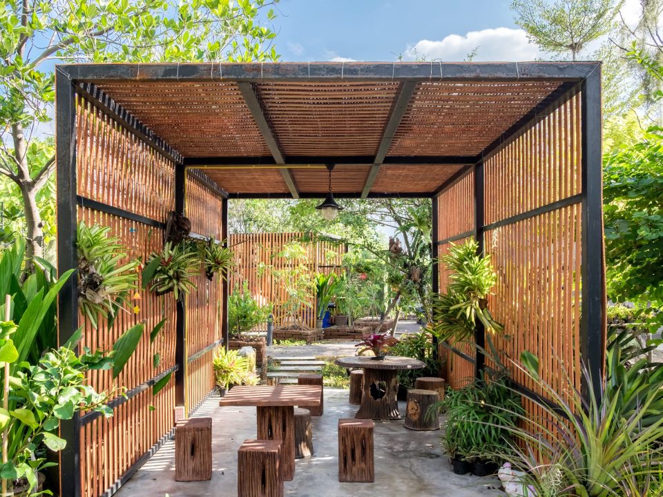 Metal pergola with timber cladding