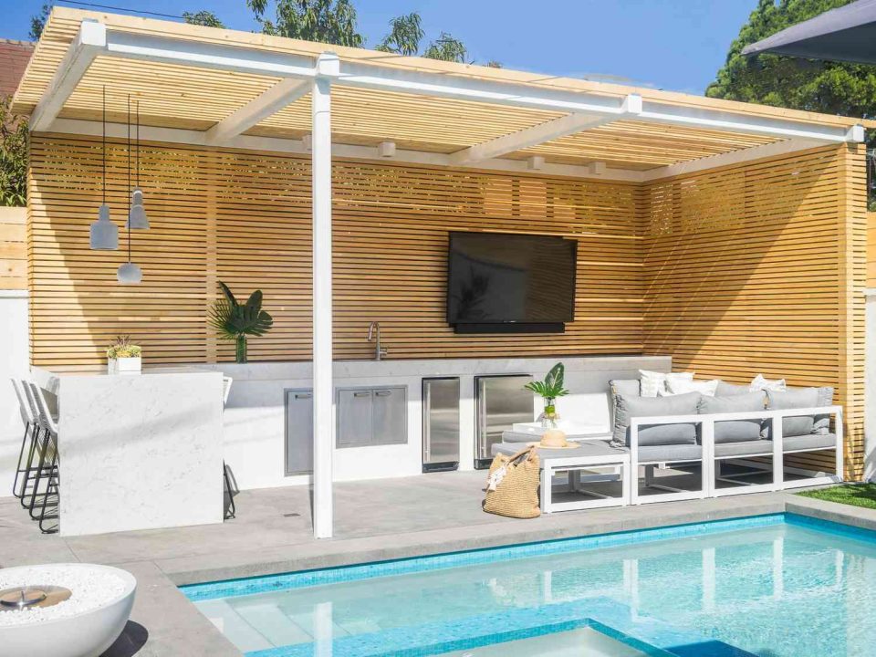 Strip pine pergola with built in outdoor TV