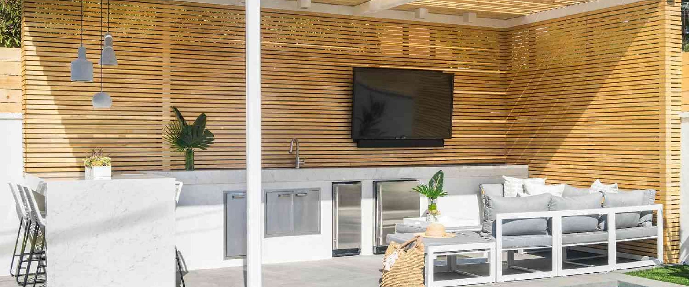 Strip pine pergola with built in outdoor TV