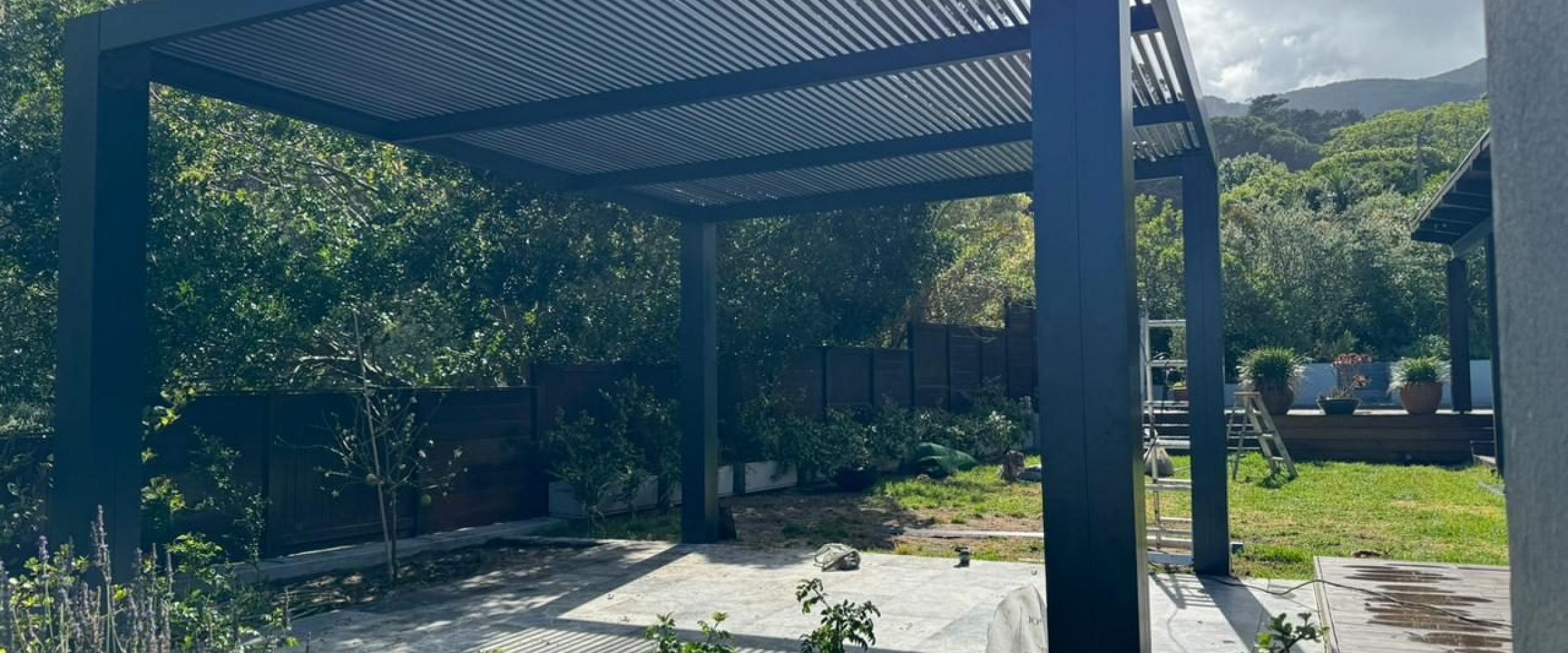Aluminium pergola with automated drop down blind, photo 1