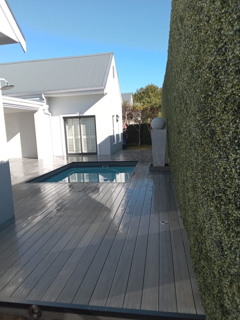 Composite grey decking around pool, photo 9
