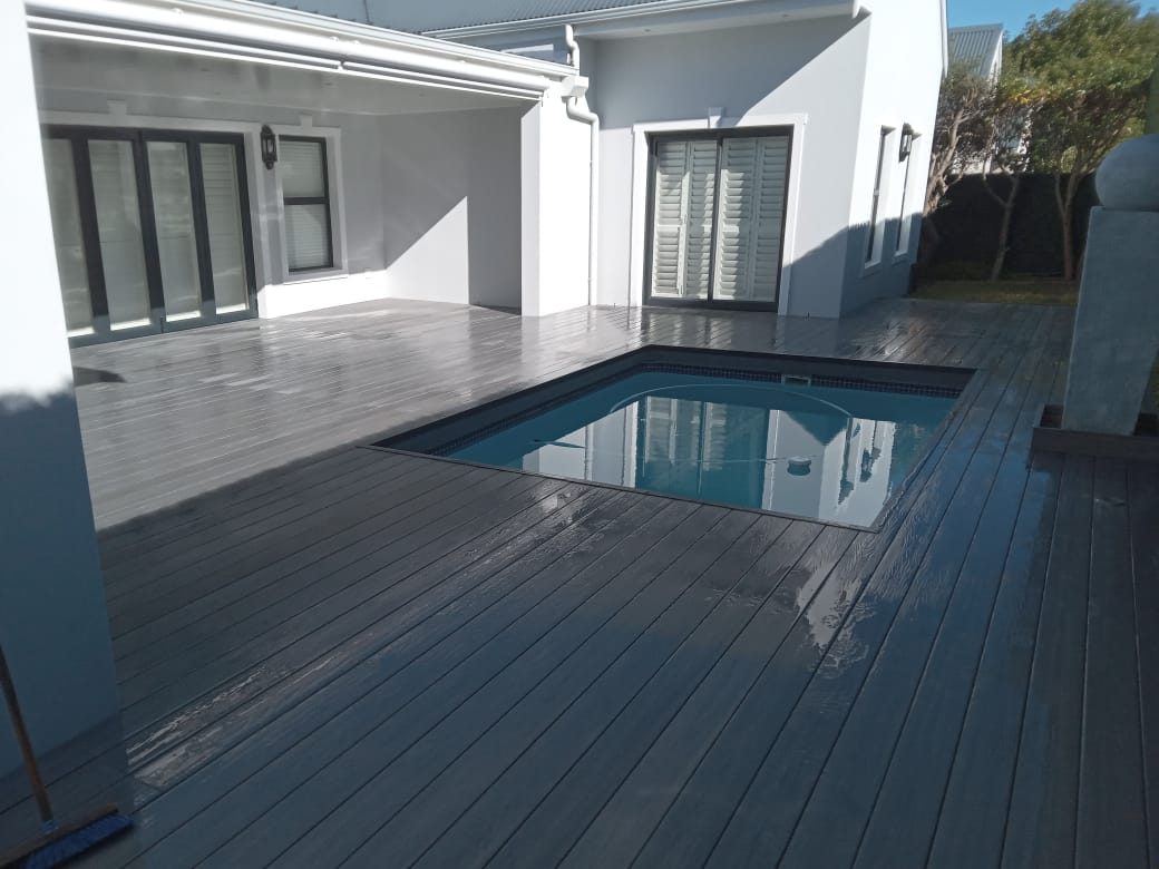 Composite grey decking around pool, photo 10