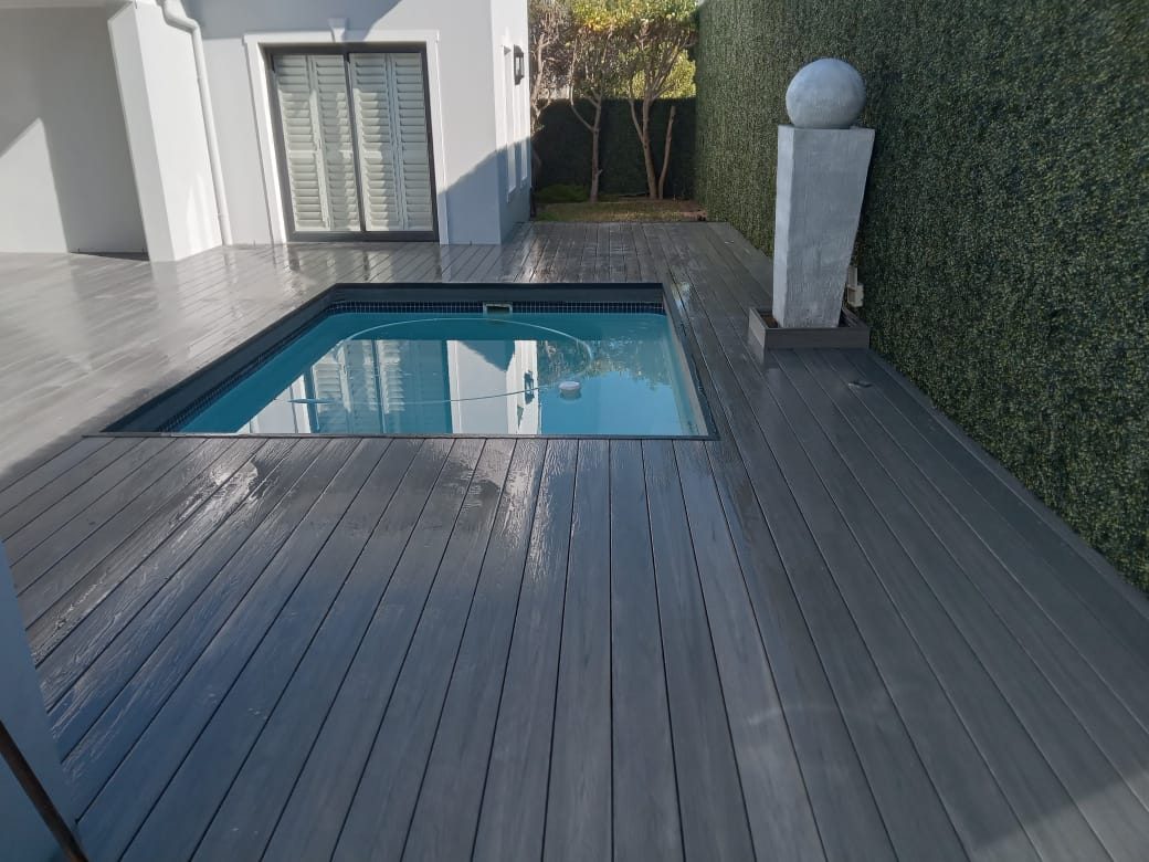 Composite grey decking around pool, photo 11