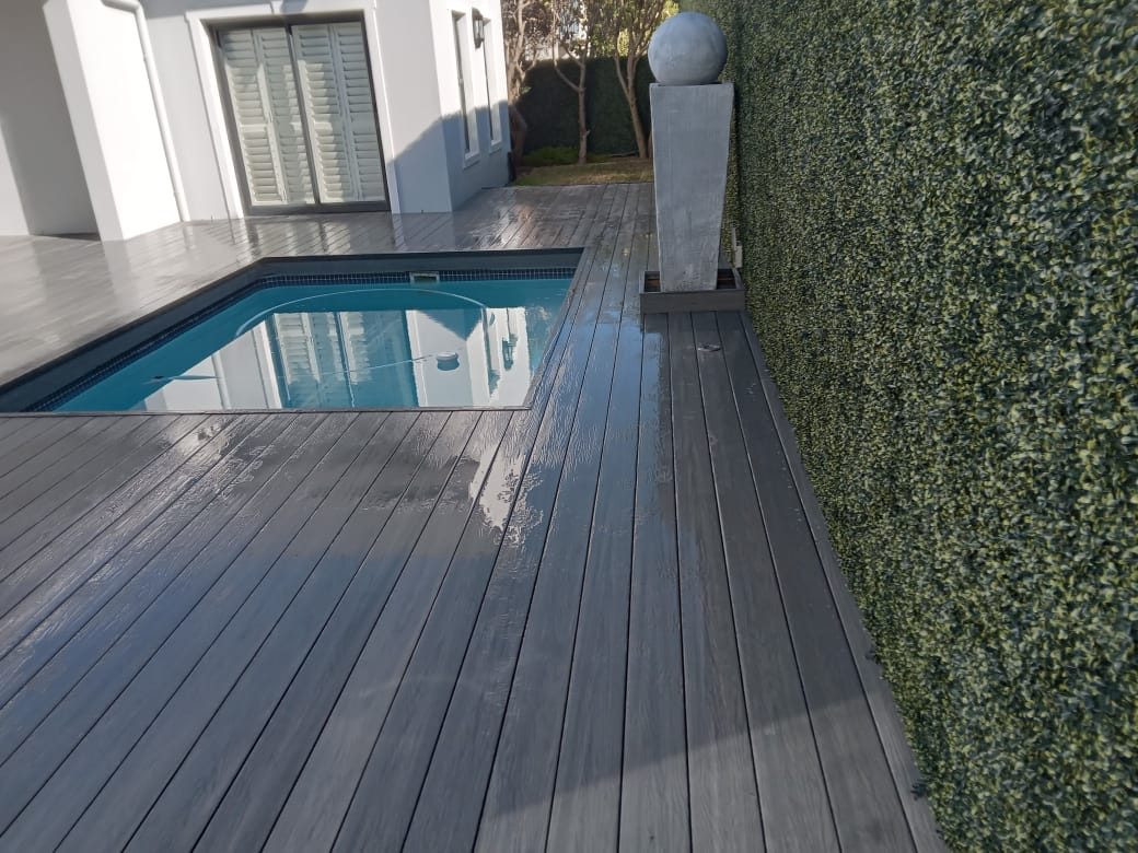 Composite grey decking around pool, photo 12