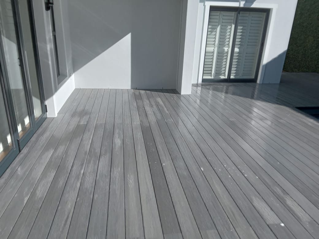 Composite grey decking around pool, photo 14