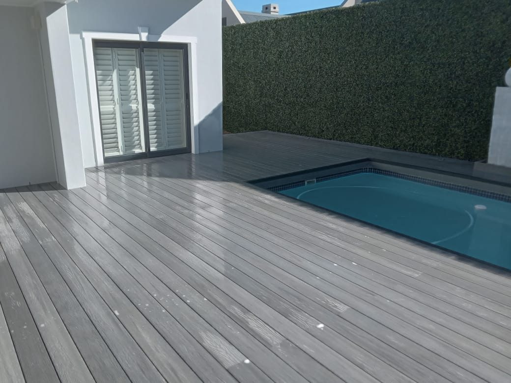Composite grey decking around pool, photo 15