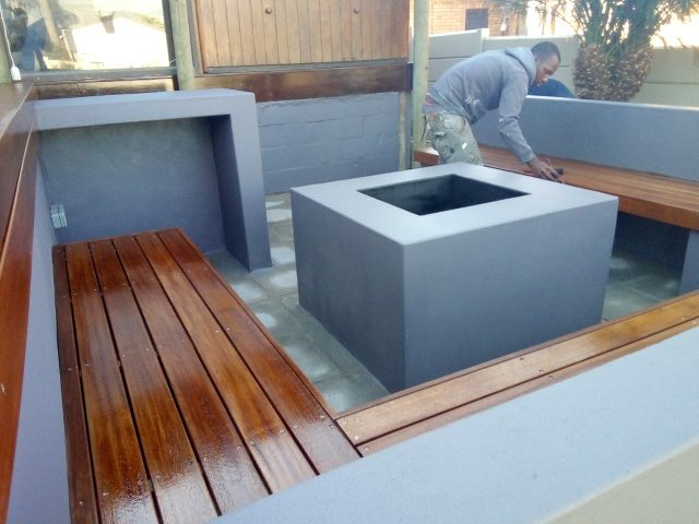 Floating timber seating with firepit