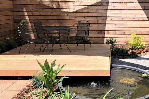 A stunning floating deck area atop a pond