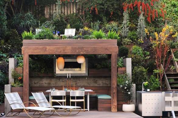 A floating deck area with a kitchen