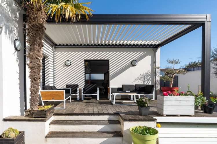 A Louvered Pergola.