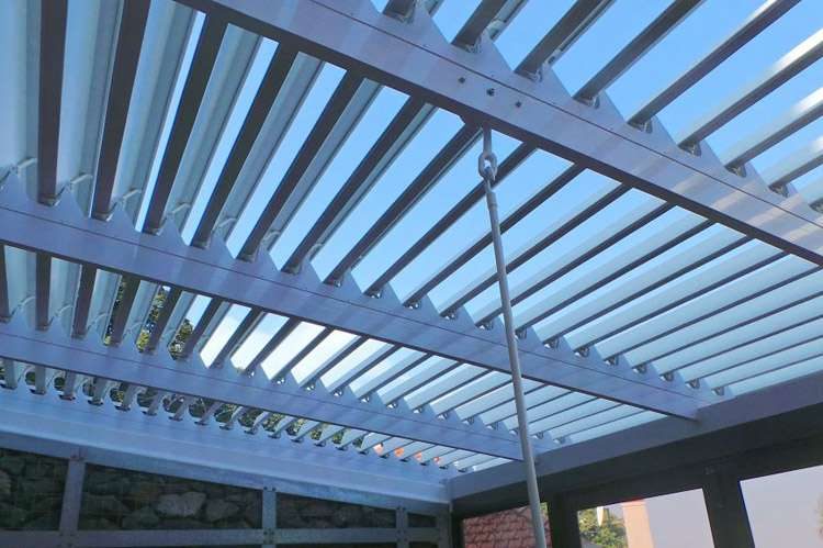 A manual opening louvered roof.